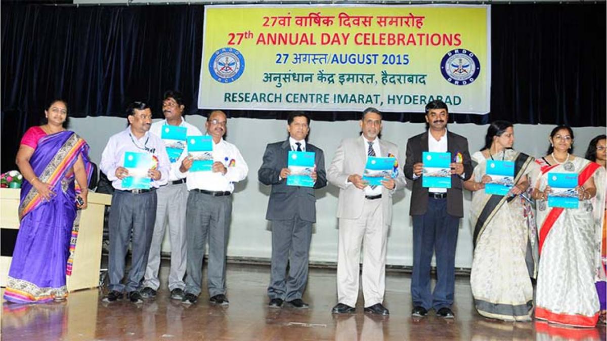 Dr Rajiv Sharma, Chief Secretary Govt of Telangana  and  Dr G Satheesh Reddy, SA to RM & Director RCI releasing the Anmol Magazine on the occasion of 27th Annual day celebration of RCI